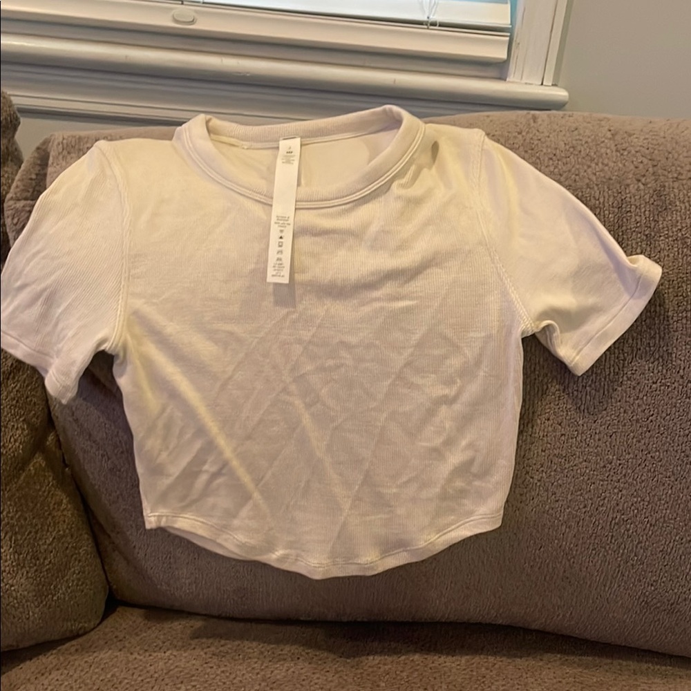 Lululemon Athletica Cream/Off White Short Sleeve Top